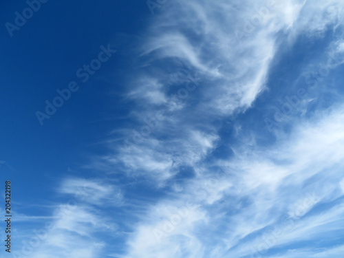 Blue sky with cirrus clouds. Beautiful cloudscape