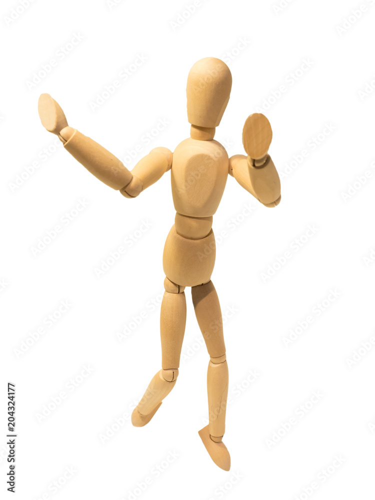 Wooden puppet is dancing isolated on white background. Wooden puppet is dancing isolated on white background.