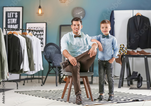 Stylish father and son in s...