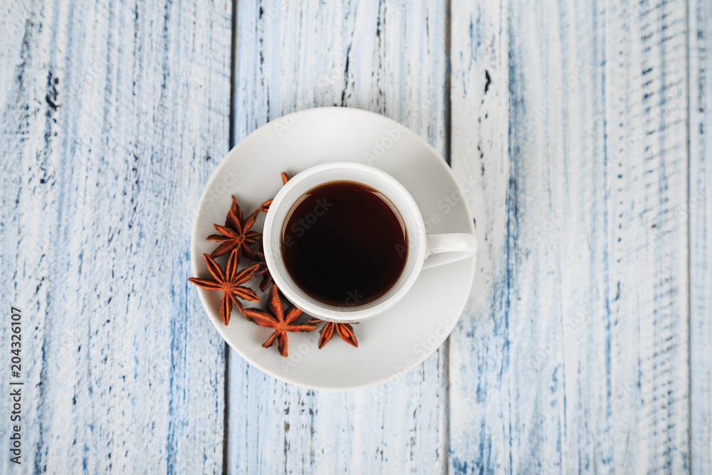 white coffe cup on light wooden background white coffe cup on light wooden background