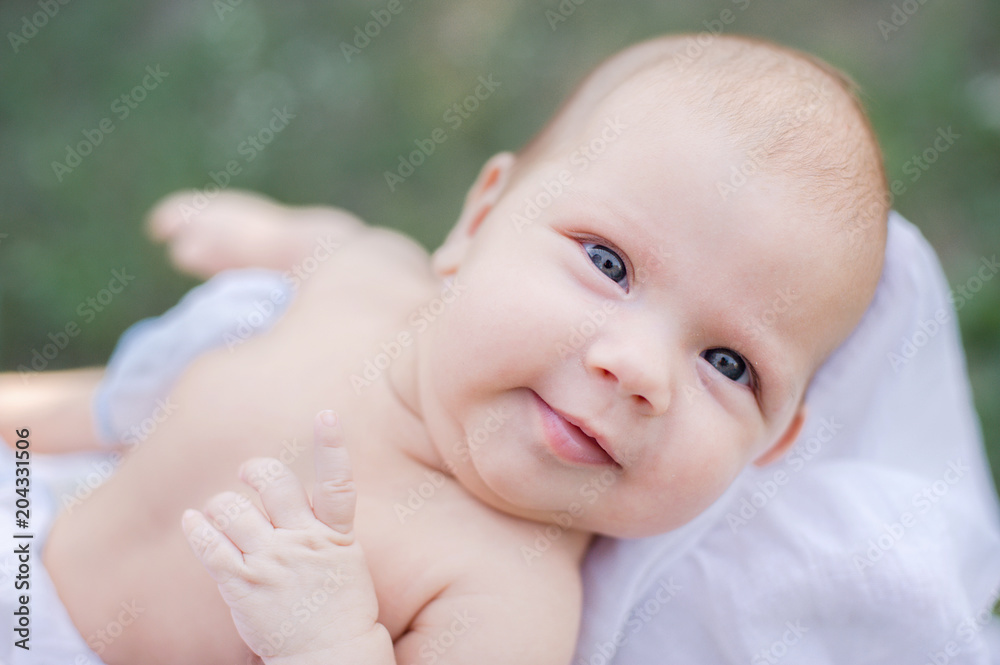 sunbathing baby. Child Taking a Sunbath. sunbathing baby. Child Taking a Sunbath.