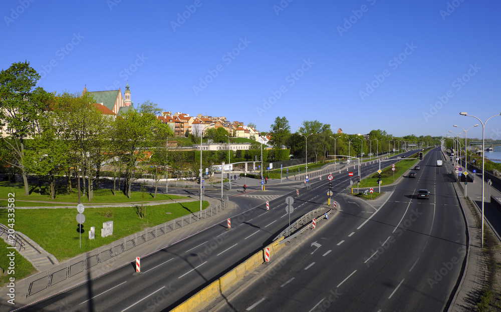 Warsaw, Poland - Panoramic view of Wybrzeze Gdanskie Coast artery with historic old town quarter in background