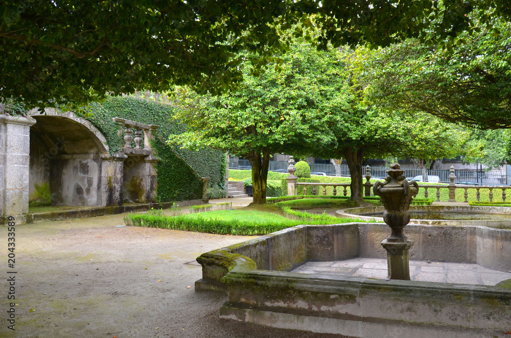 Beautiful 3-landing garden decorated with a Baroque fountain near Vila Flor. Vila Flor Palace, built by Tadeu Luis Antonio Lopes de Carvalho de Fonseca and Camoes in 18th century. Guimaraes, Portugal Beautiful 3-landing garden decorated with a Baroque fountain near Vila Flor. Vila Flor Palace, built by Tadeu Luis Antonio Lopes de Carvalho de Fonseca and Camoes in 18th century. Guimaraes, Portugal