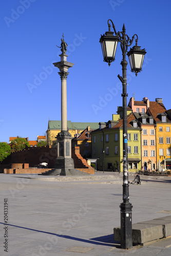 Warsaw, Poland - Historic quarter of Warsaw old town - Royal Castle Square and historic tenements with Sigismund's Column III Waza monument photo