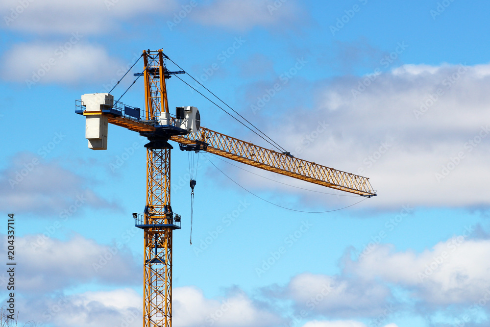 Crane building the power station. Sky background. Crane building the power station. Sky background.