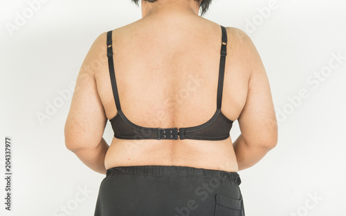 The back of the fat man is fat and black bra. Stock Photo