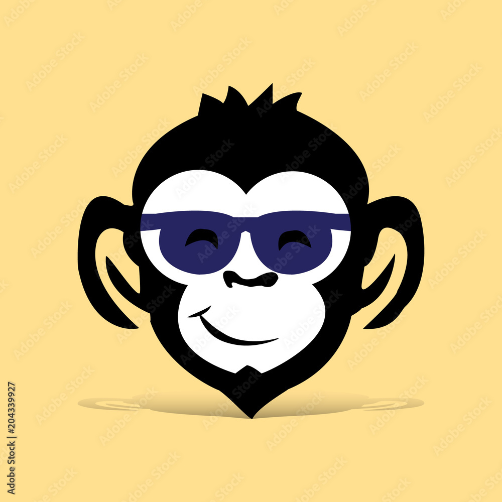 Head of black monkey with glasses, cartoon on light brown background,