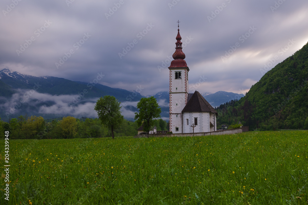 Typical slovenian church in the mountains, near Bohinj lake. Slovenia