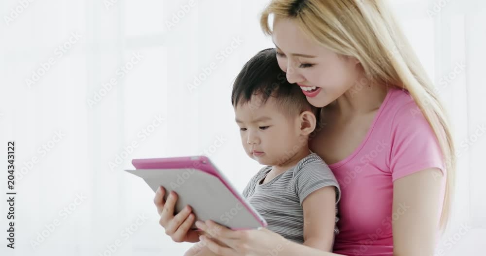 mommy use tablet with son mommy use tablet with son