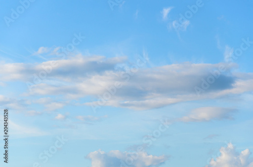 Beautiful clouds on blue sky, background, free space for text