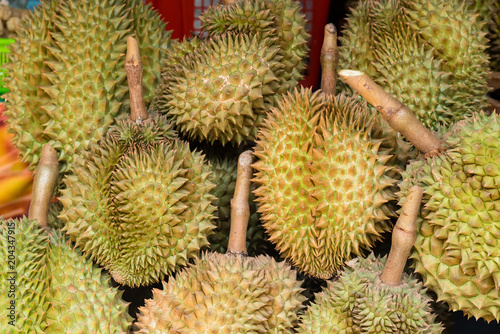 These are Durian. Durian has been arranged on the shelf to be displayed to the buyer.We called The King of the fruit. Durian have his self season.