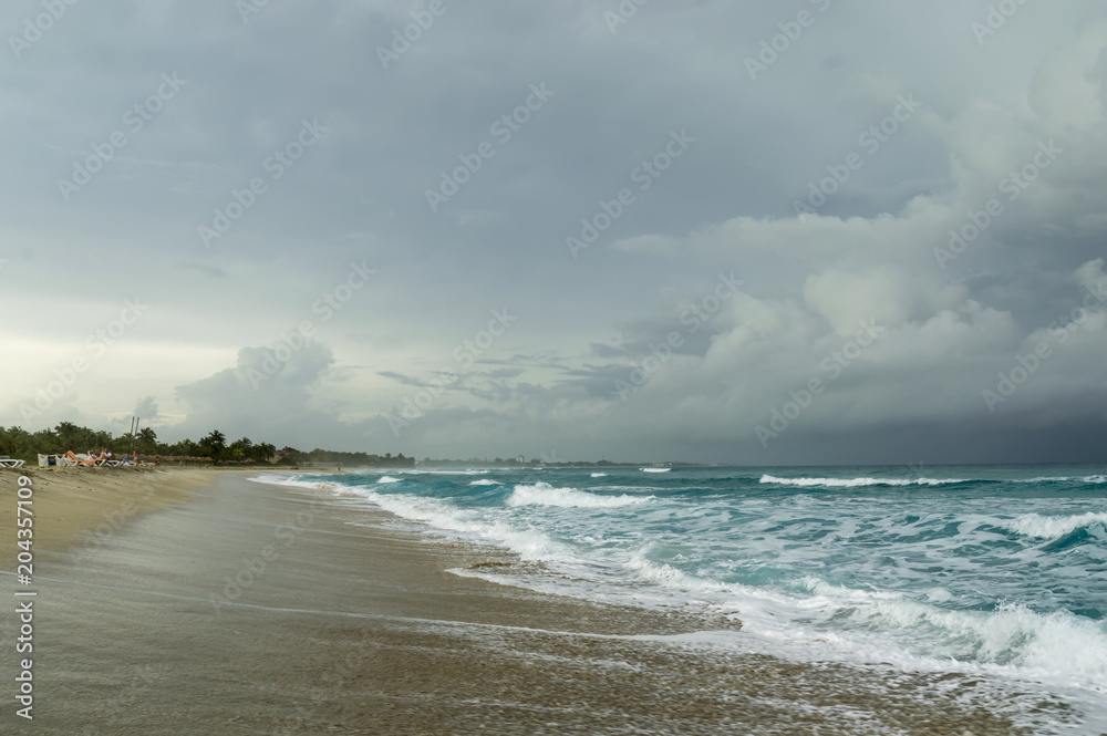 in the surf zone of the Atlantic Ocean, curtains, water haze over the coast, cloud cover, Varadero  Cuba