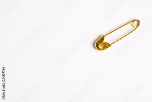 Copper pin isolated on white background. 