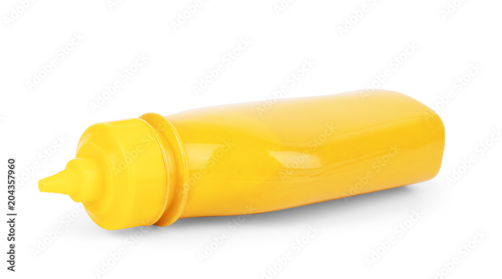 A yellow mustard bottle against a white background A yellow mustard bottle against a white background