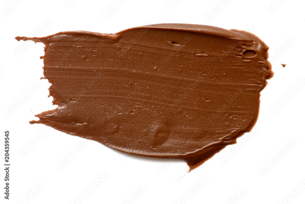 Cream chocolate spreading isolated over white backround. Food background for your design