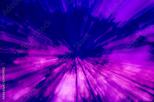 Creative abstract background reminding of a burst full of dynamics in blue  magenta  violet  indigo ect.