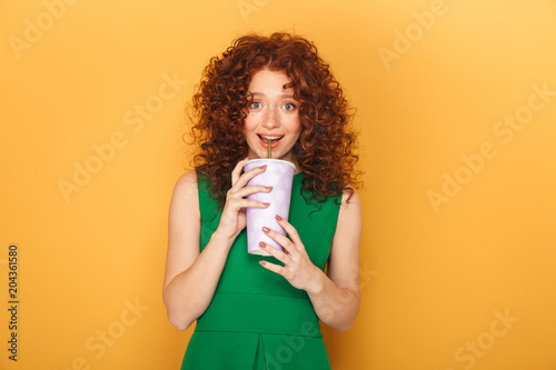 Portrait of a lovely redhead woman in dress