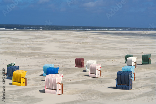Background of multi colored beach chairs
