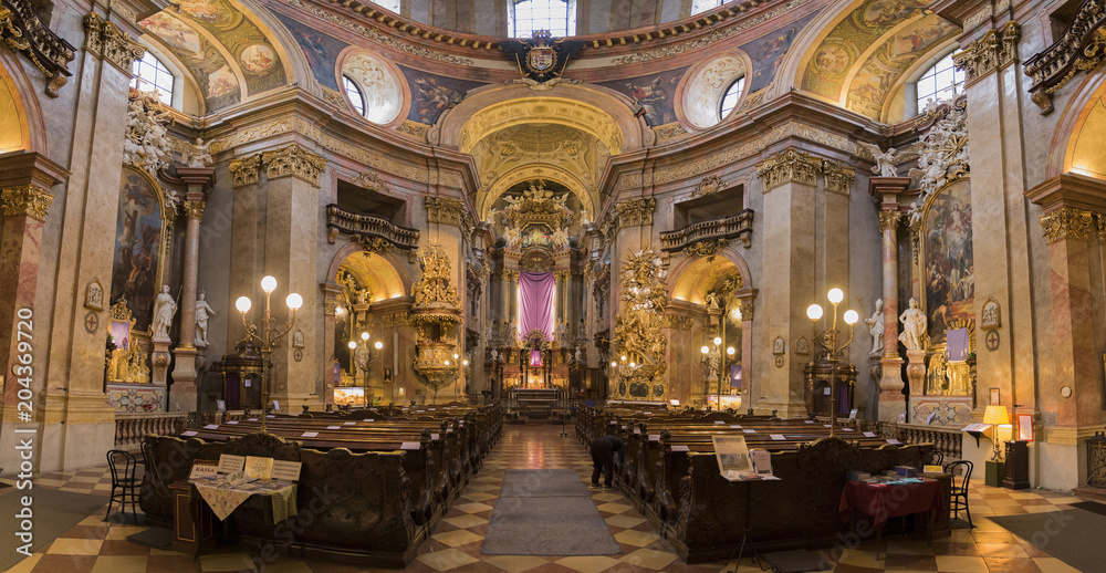 The beautiful panoramic interior of St. Peter's Church (Peterskirche), a Baroque Roman Catholic parish church in Vienna, Austria The beautiful panoramic interior of St. Peter's Church (Peterskirche), a Baroque Roman Catholic parish church in Vienna, Austria
