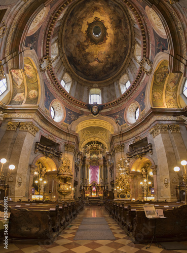 The beautiful panoramic interior of St. Peter s Church  Peterskirche   a Baroque Roman Catholic parish church in Vienna  Austria