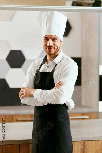 Young Cook In Kitchen. Portrait