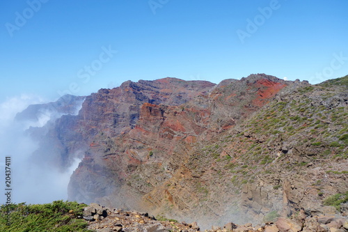 Hiking trail GR131 Rute de los Volcanes leading on the edge of Caldera de Taburiente which is the largest erosion crater in the world, La Palma, Canary Islands, Spain photo