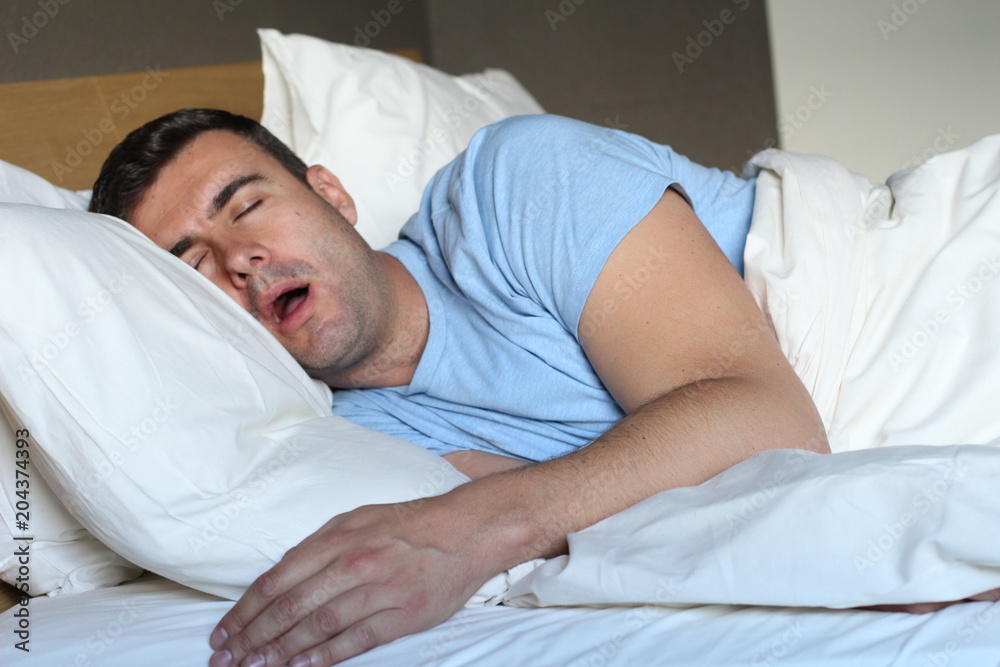 Passed out man drooling in bed Passed out man drooling in bed