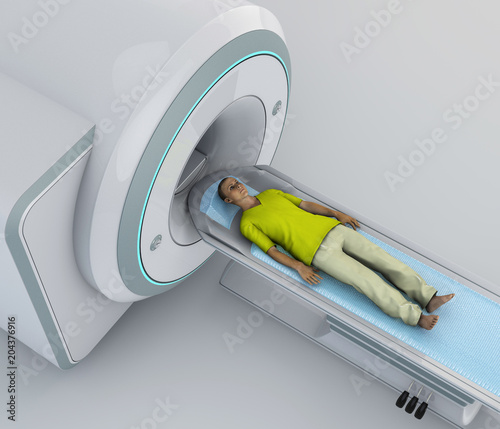 Tomografia computerizzata, radiologia, Tac, radiodiagnostica, riproduzione di immagini in sezione dell'anatomia. Giovane paziente sdraiato pronto per una tomografia assiale computerizzata photo
