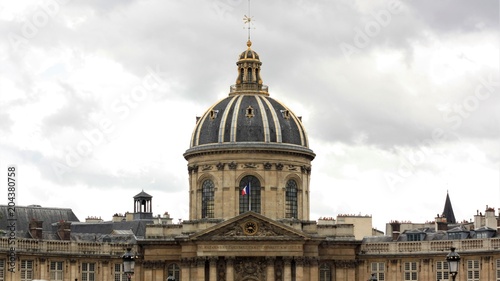 Historical government stone building with symmetrical architecture with a dome on the roof in a European city