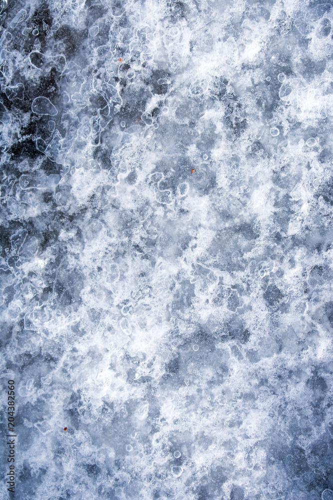 Frozen ice on the ground, good for a background Frozen ice on the ground, good for a background