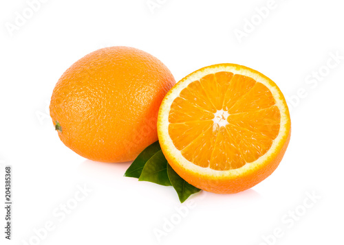 whole and half cut fresh Navel orange with leaf on white background