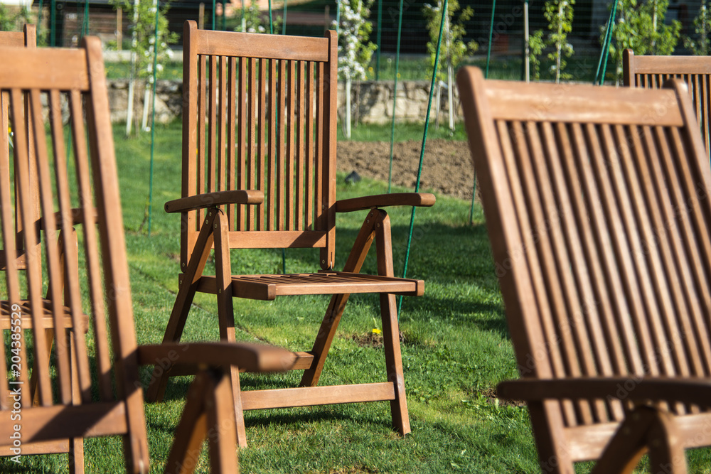 Wooden chairs at garden for relax Wooden chairs at garden for relax