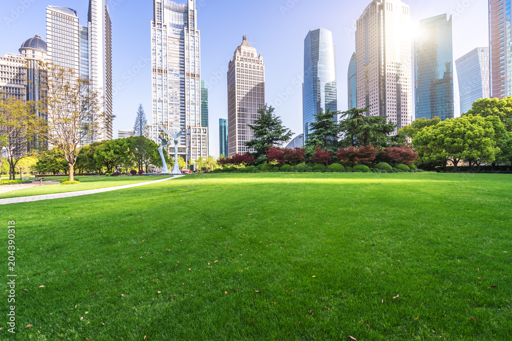 green lawn with modern office building