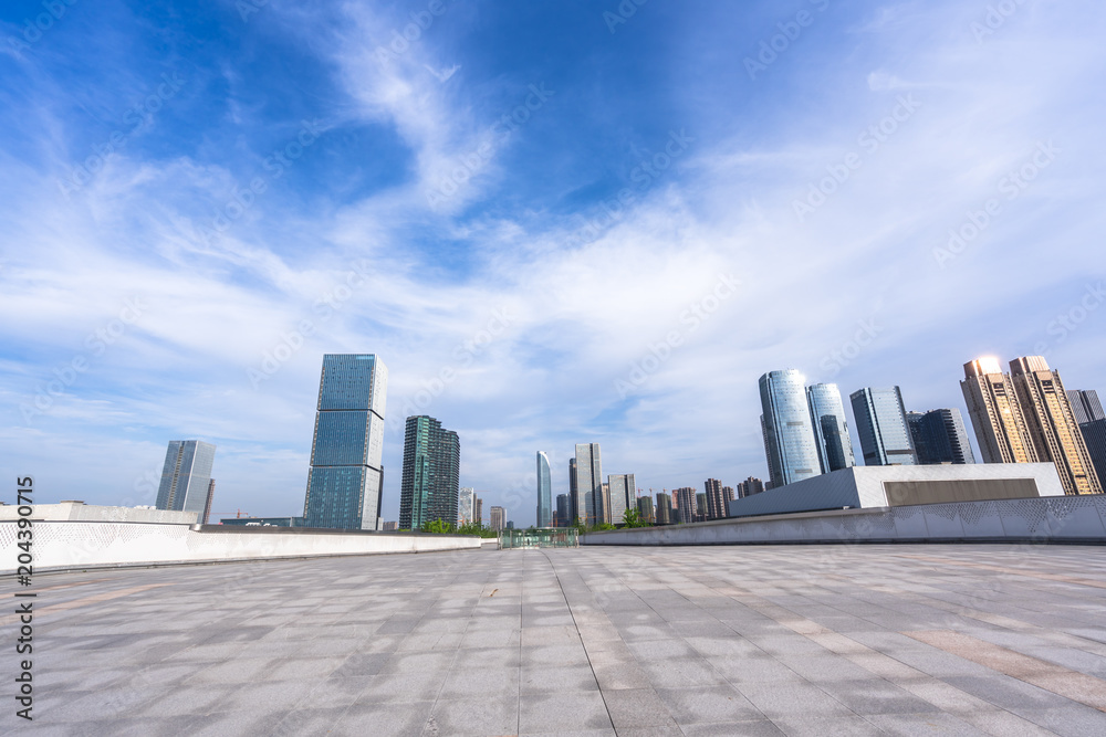 Obraz premium empty floor with panoramic city skyline