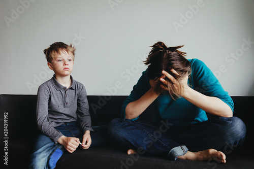 sad child with mother, family in trouble