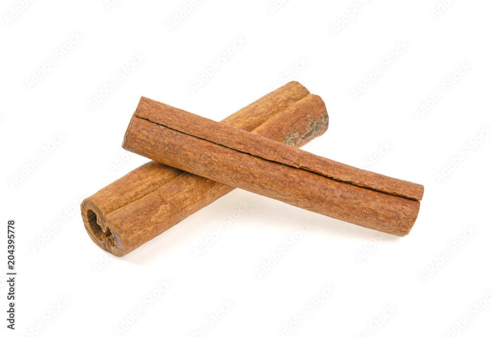two cinnamon sticks on a white background two cinnamon sticks on a white background