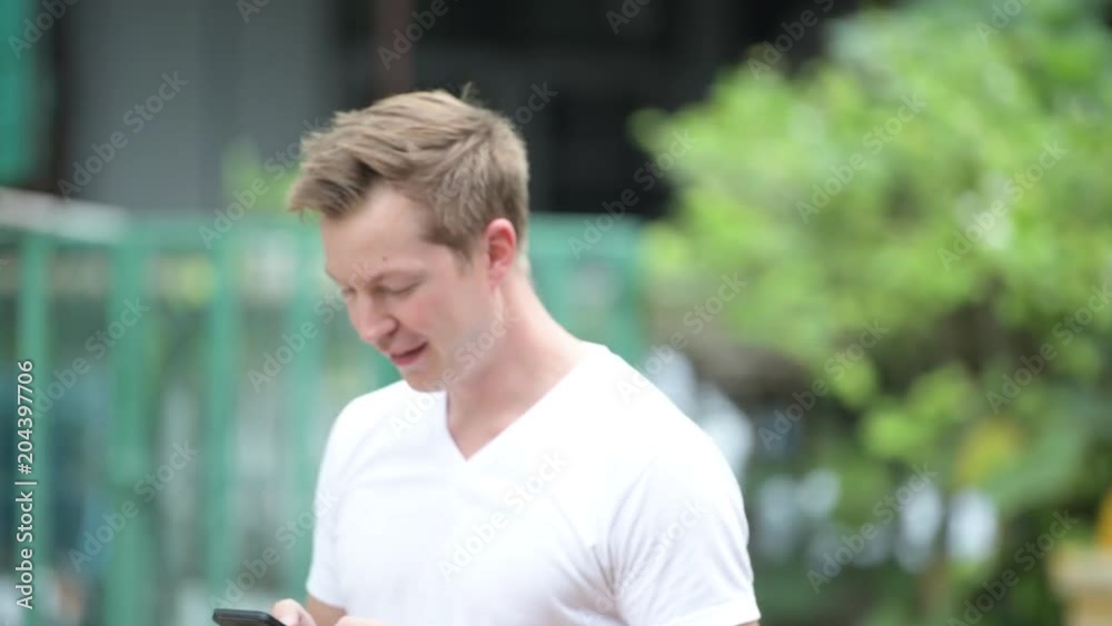 Young handsome man in the streets outdoors Young handsome man in the streets outdoors