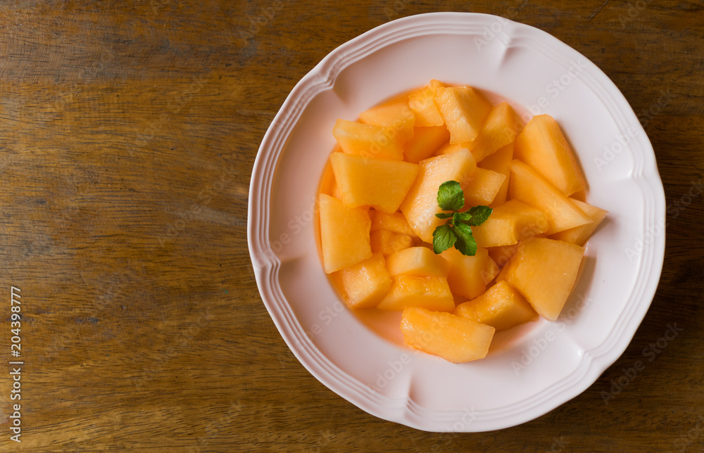 fresh melon slices on dish fresh melon slices on dish
