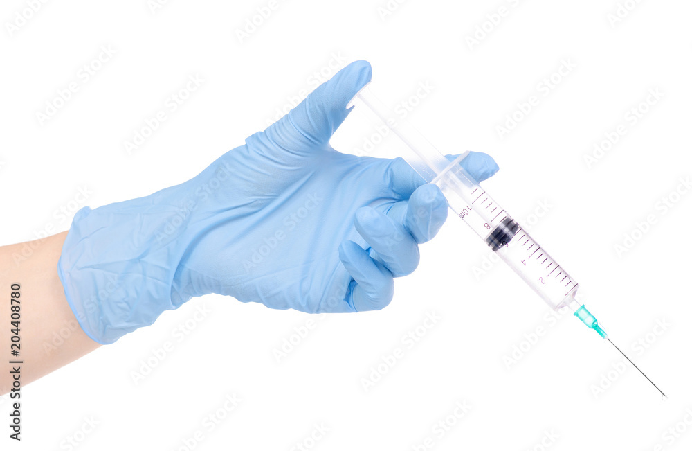 Syringe in hand medical glove medicine Syringe in hand medical glove medicine