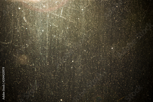 Sunlight goes throught dirty window