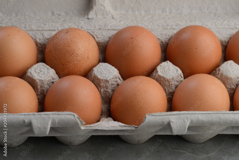 Brown eggs in container Brown eggs in container