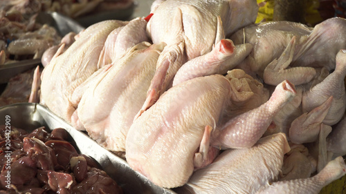 Billede på lærred Fresh chicken at market