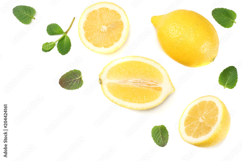 Fototapeta premium healthy food. sliced lemon with green leaf isolated on white background top view