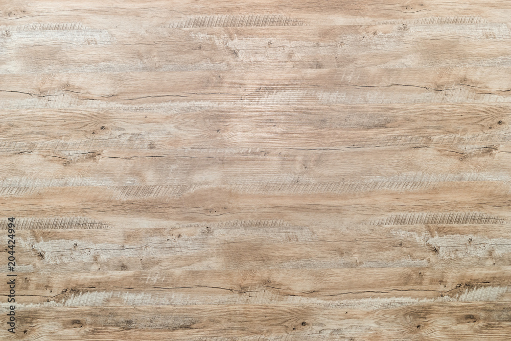 Wooden plank with textured pattern used as background Wooden plank with textured pattern used as background