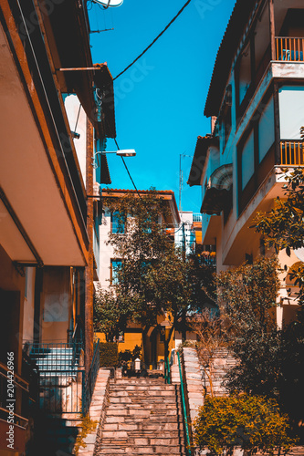 ancient stairs between mediterranean houses photo