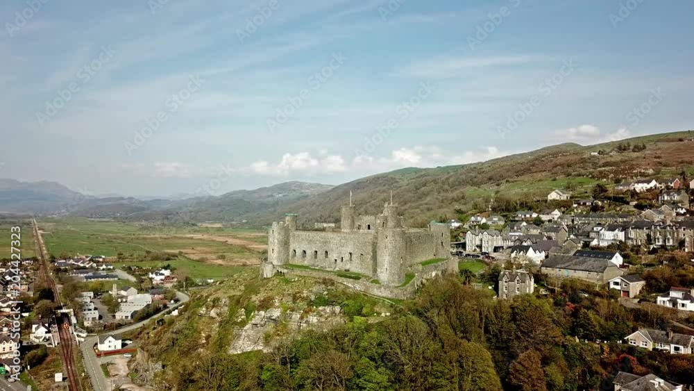 Aerial view of the skyline of Harlech with it's 12th century castle, Wales, United Kingdom Aerial view of the skyline of Harlech with it's 12th century castle, Wales, United Kingdom