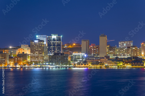 Halifax City skyline at night from Dartmouth waterfront, Nova Scotia, Canada.