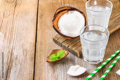 Fresh Organic Coconut Water in a Glass. Food background, selective focus.