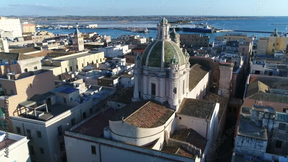 Aerial view panning around Trapani Cathedral dome or Basilica of St. Lawrence the Martyr is cathedral of Roman Catholic Diocese of Trapani dedicated to Saint Lawrence in Trapani Sicily Italy 4k Aerial view panning around Trapani Cathedral dome or Basilica of St. Lawrence the Martyr is cathedral of Roman Catholic Diocese of Trapani dedicated to Saint Lawrence in Trapani Sicily Italy 4k