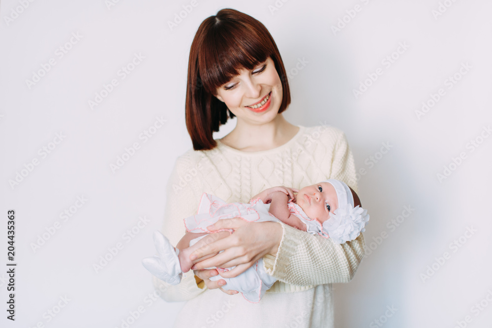 Mother with baby isolated on white background. Happy family. Mother with baby isolated on white background. Happy family.